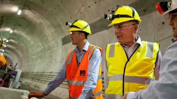 Lord mayor Graham Quirk and then-deputy PM Warren Truss at the Legacy Way construction site in 2013.