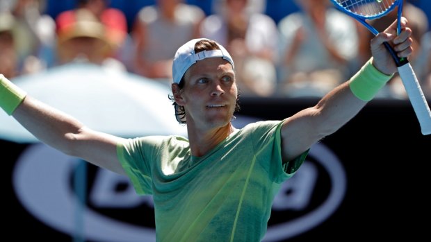 Tomas Berdych of the Czech Republic celebrates after defeating Italy's Fabio Fognini.