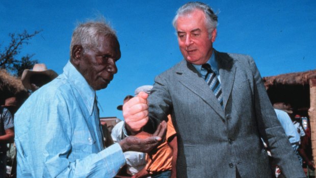 Then prime minister Gough Whitlam pours sand into the hand of Vincent Lingiari at an official ceremony to return traditional lands in the Northern Territory to the Gurindji people in 1975.