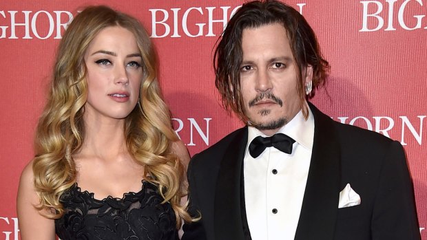  Amber Heard, left, and Johnny Depp in 2016 before their separation. 