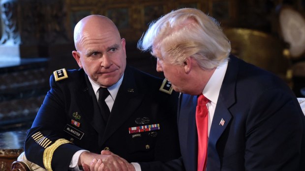 President Donald Trump, right, shakes hands with Army Lt. General H.R. McMaster, left, at Trump's Mar-a-Lago estate in Palm Beach, Florida.