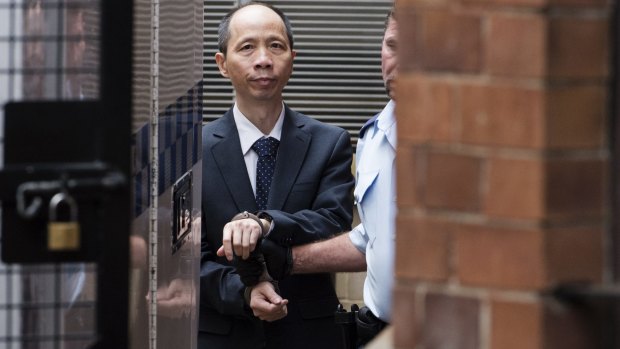 Lian Bin "Robert" Xie leaves the Supreme Court on Tuesday after being granted bail.
