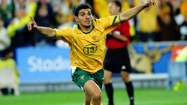 Iconic moment: John Aloisi celebrates scoring the goal that sent the Socceroos to the World Cup.