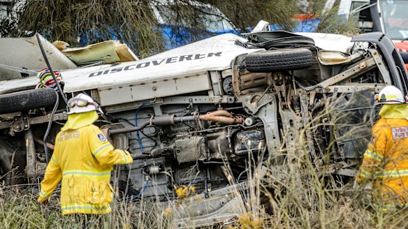 A 72-year-old woman died after her van and a truck collided south of Gunning on Thursday morning.