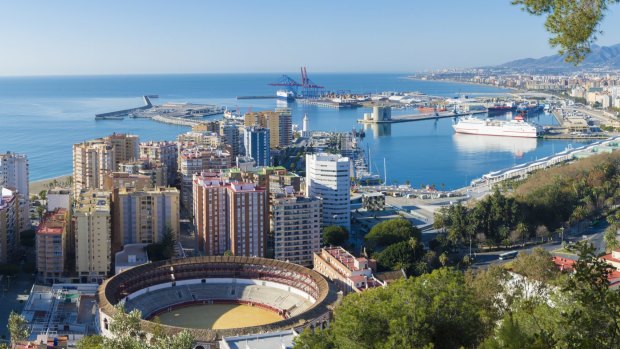 The city and harbour of Malaga.
