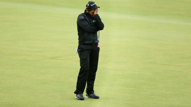 A disappointed Jason Day after missing his birdie putt on the 18th.