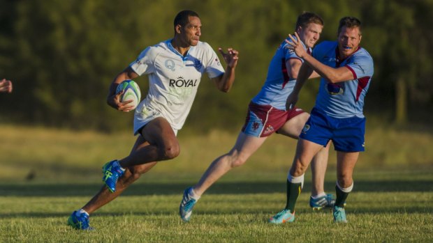Queanbeyan's Ratu Tagive makes a break against Wests in the ACT Rugby Union club sevens competition last Friday.