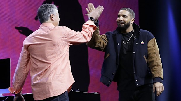 Drake, right, who will host a show, with Eddy Cue, an Apple executive, at the Apple Music introduction.