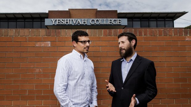 Advocate and abuse victim Manny Waks (left) with Yeshivah spokesman Yechiel Belfer on Sunday.