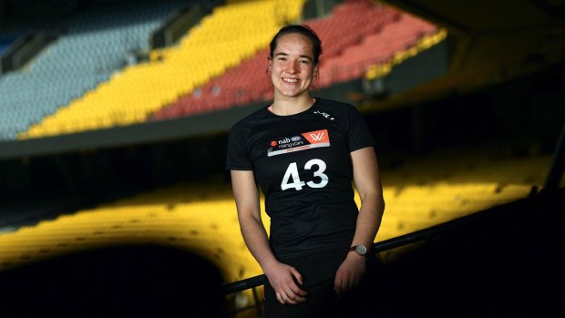 Isabel Huntington says the part-time AFLW gives her the chance to pursue both her goals. 