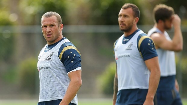 Matt Giteau and Quade Cooper during a Wallabies training session at Ballymore Stadium in Brisbane on Thursday. 