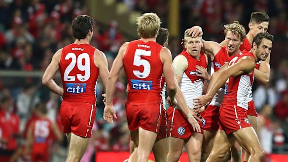 Big comeback: Dan Hannebery of the Swans celebrates a goal.