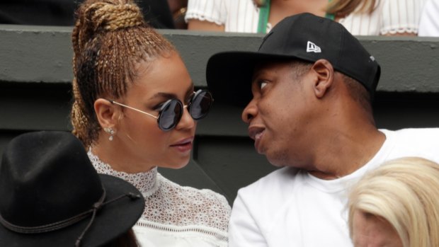Singer Beyonce and her husband, rapper Jay Z, watch Serena Williams play Angelique Kerber in the women's singles final.