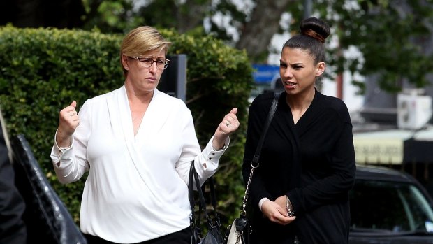Dane McNeill's mother Rebecca McNeill, with his girlfriend Jade Patterson outside court
