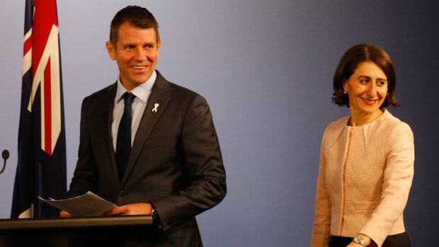 All smiles: NSW Premier Mike Baird and Treasurer Gladys Berejiklian last month. The budget half-yearly review detailing the budget windfall is expected to released on Thursday.