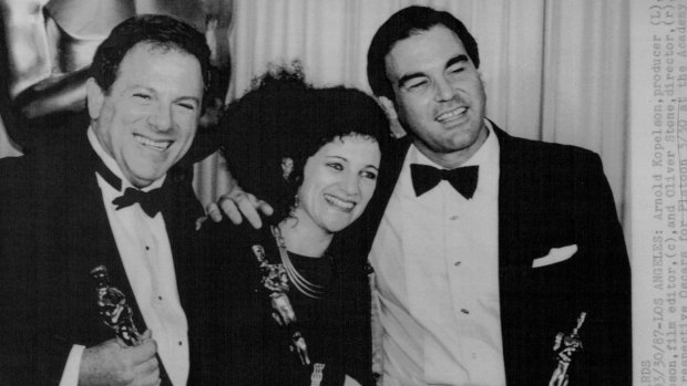 Peter Kopelson's father, Arnold Kopelson, is a Hollywood film producer with nearly 30 films to his name. Here he celebrates picking up an Oscar for <i>Platoon</i>, alongside the film's editor Claire Simpson (centre) and director Oliver Stone.