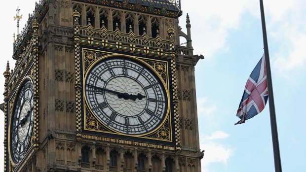 A flag flies half mast over Portcullis House, Westminster, in memory of Jo Cox.