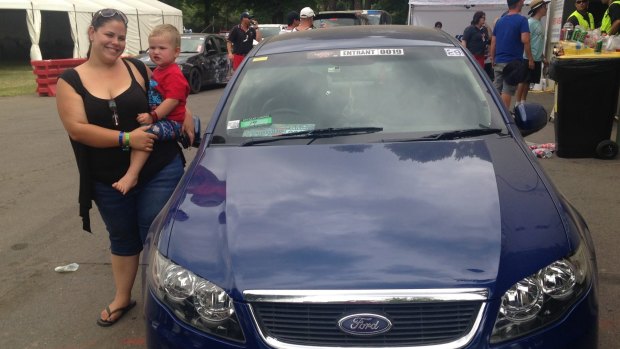 Hayley-Jade Franke, 22, with son Leo, 3, and her Ford Falcon.