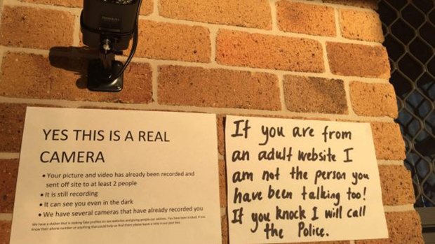 Signs and security put up by Robyn Night and her husband, River, in response to dozens of visits from men expecting sex