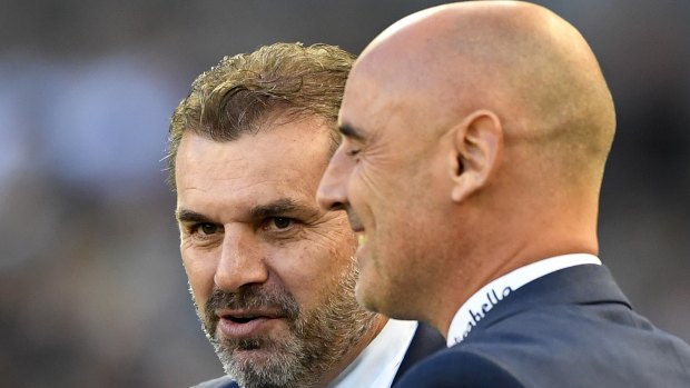 Feeling positive: Melbourne Victory coach Kevin Muscat (right) thinks Ange Postecoglou's men are capable of holding their own in Honduras.