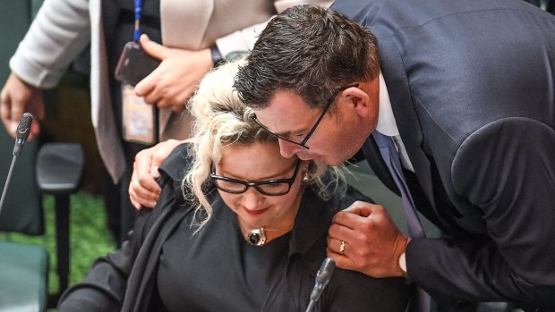 Premier Daniel Andrews congratulates Health Minister Jill Hennessy on the passing of the bill in the lower house after an all-night sitting.