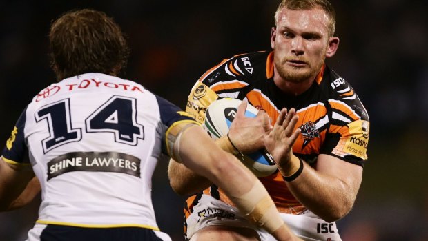 Matt Lodge in action for Wests Tigers against the Cowboys in 2015.