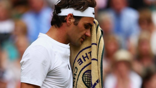 A dejected Roger Federer.