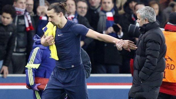 PSG's Zlatan Ibrahimovic, left, is congratulated by Chelsea manager Jose Mourinho.