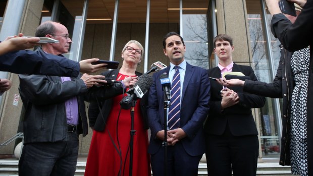 Greens Senator Janet Rice with MP Alex Greenwich and  Human Rights Law Centre lawyer Anna Brown outside the Law Courts in Sydney where they have lodged a case against the federal government regarding same-sex marriage.