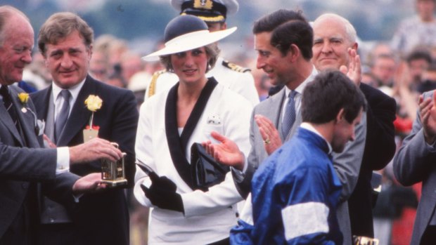 Hilton Nicholas (left), chairman of the VRC, during a presentation ceremony with Princess Diana and Prince Charles at the Melbourne Cup in 1985.