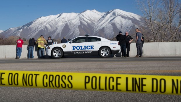 Officials respond to a report of car in the Spanish Fork River in Spanish Fork, Utah, where an 18-month-old girl survived a car crash in a frigid Utah river.