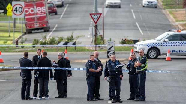 Police at the scene of the shooting in May.n Tuesday.