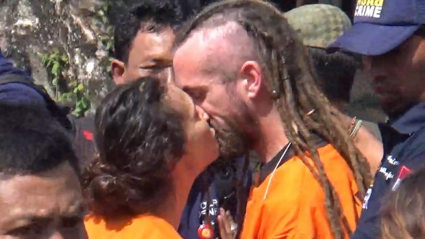 Sara Connor and David Taylor kiss in August during a police re-enactment of the events that led to the death of Wayan Sudarsa.