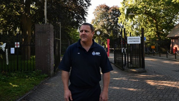 Senior Sergeant Rod Anderson at the front gates of the Hilversum military base, where the bodies of the MH17 victims were brought once they landed in the Netherlands.