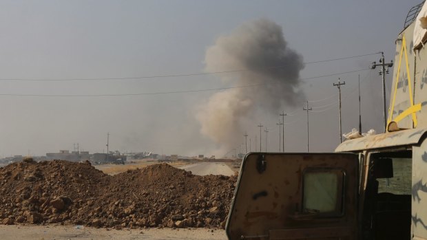 Smoke rises from Islamic state positions after an airstrike by coalition forces in villages surrounding Mosul.