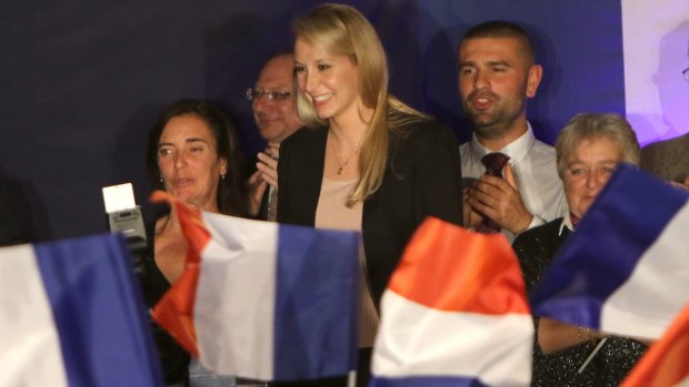 Marion Marechal-Le Pen delivers a speech to supporters after the first round of regional elections in France.