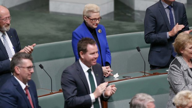 Former speaker Bronwyn Bishop holds her hands as other MPs applaud the election of Tony Smith as her replacement on Monday.