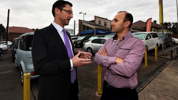 Dr Mark Kohout, left, and Dr Laith Barnouti at the car yard they hoped to turn into a private hospital and medical centre.