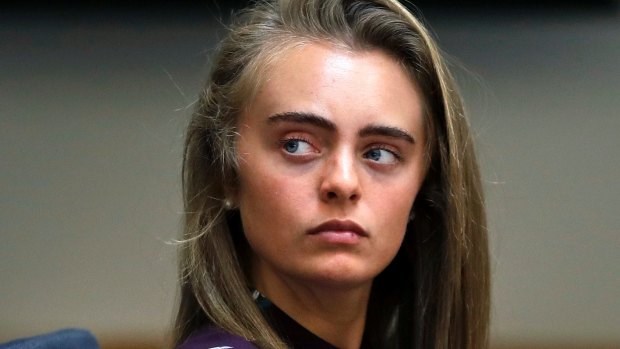 Michelle Carter listens to testimony at Taunton District Court in Taunton, Massachusetts.