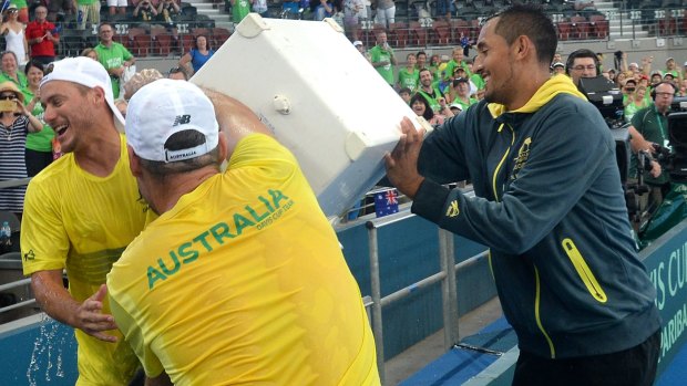 Icing the victory: Team captain Lleyton Hewitt cops a bucket of ice water after Australia's win.
