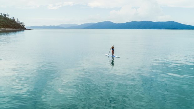 Stand-up paddle boarding in the Whitsundays.