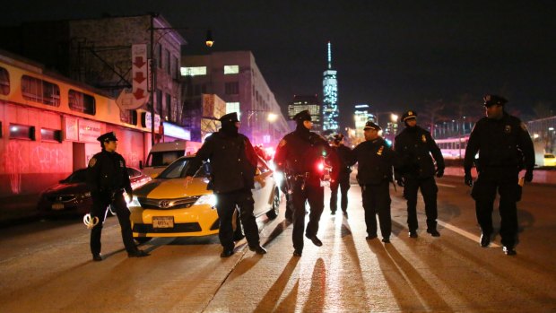 Police gather on the West Side Highway during a protest in New York. 