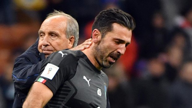 Legend: Gianluigi Buffon is comforted by Gian Piero Ventura after the final whistle.