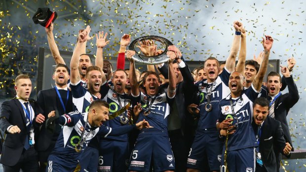Champions: Melbourne Victory celebrate winning the 2015 title.