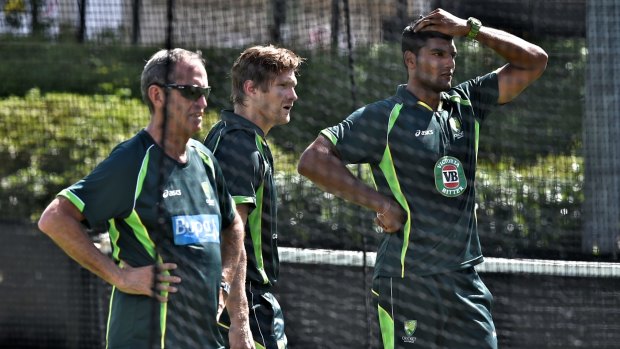 Gurinder Sandhu in the nets with Shane Watson during training at the SCG.