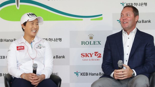 'Lucky' not to make decision: LPGA Commissioner Mike Whan with Seri Pak of South Korea before the LPGA KEB-Hana Bank Championship.