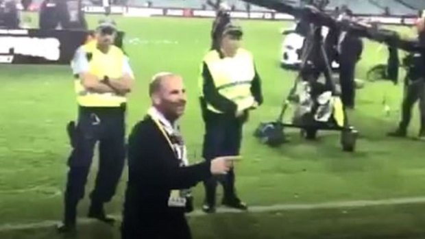 Footage of MasterChef judge George Calombaris at the A-League grand final. in Sydney.