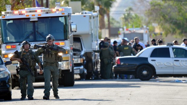 Two Palm Springs police officers trying to resolve a family dispute were shot dead on Saturday when a man they had been speaking to suddenly pulled out a gun and opened fire on them.