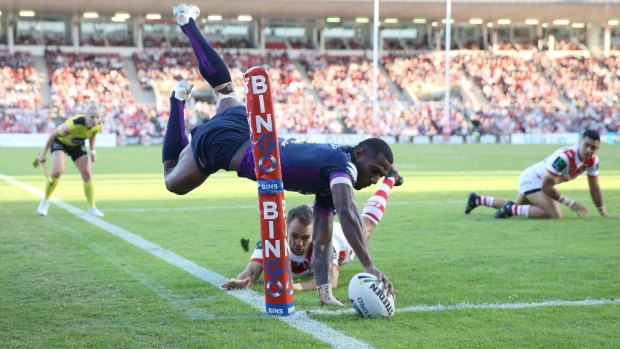 Airborne: Suliasi Vunivalu shows his brilliant finishing skills with this try against the Dragons. 