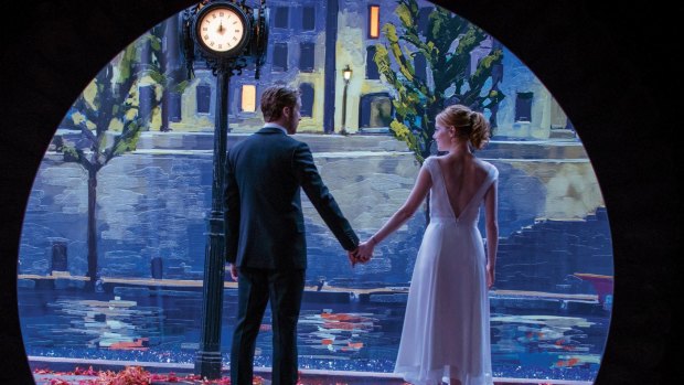 Sebastian (Ryan Gosling) and Mia (Emma Stone) light up the screen in <i>La La Land</i>.
